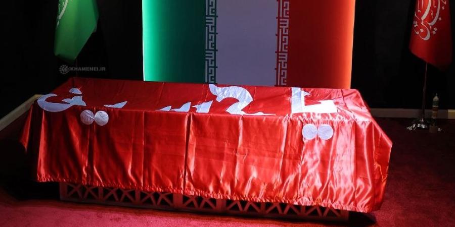 Flag of Imam Hussain's shrine over the pure body of Martyr Khamenei